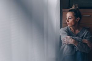 woman thinking about how long heroin withdrawal lasts
